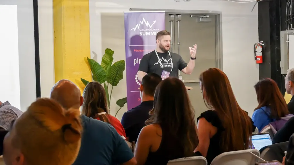 Tim Jordan speaking on stage